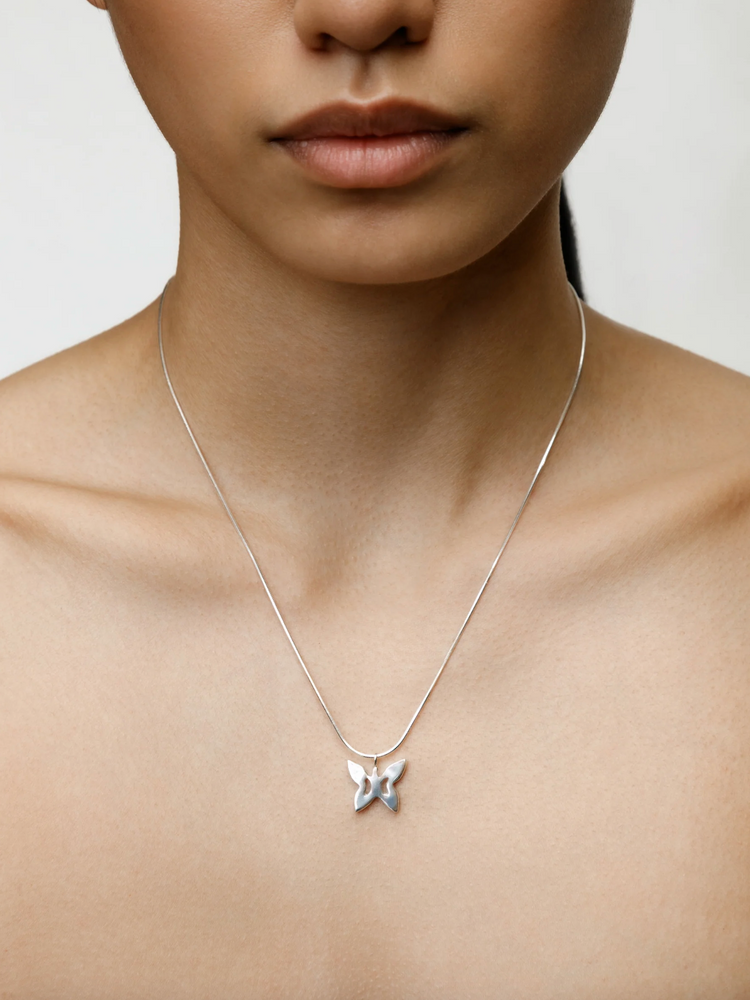 
            
                Load image into Gallery viewer, Wolf Circus Butterfly Necklace in Silver
            
        